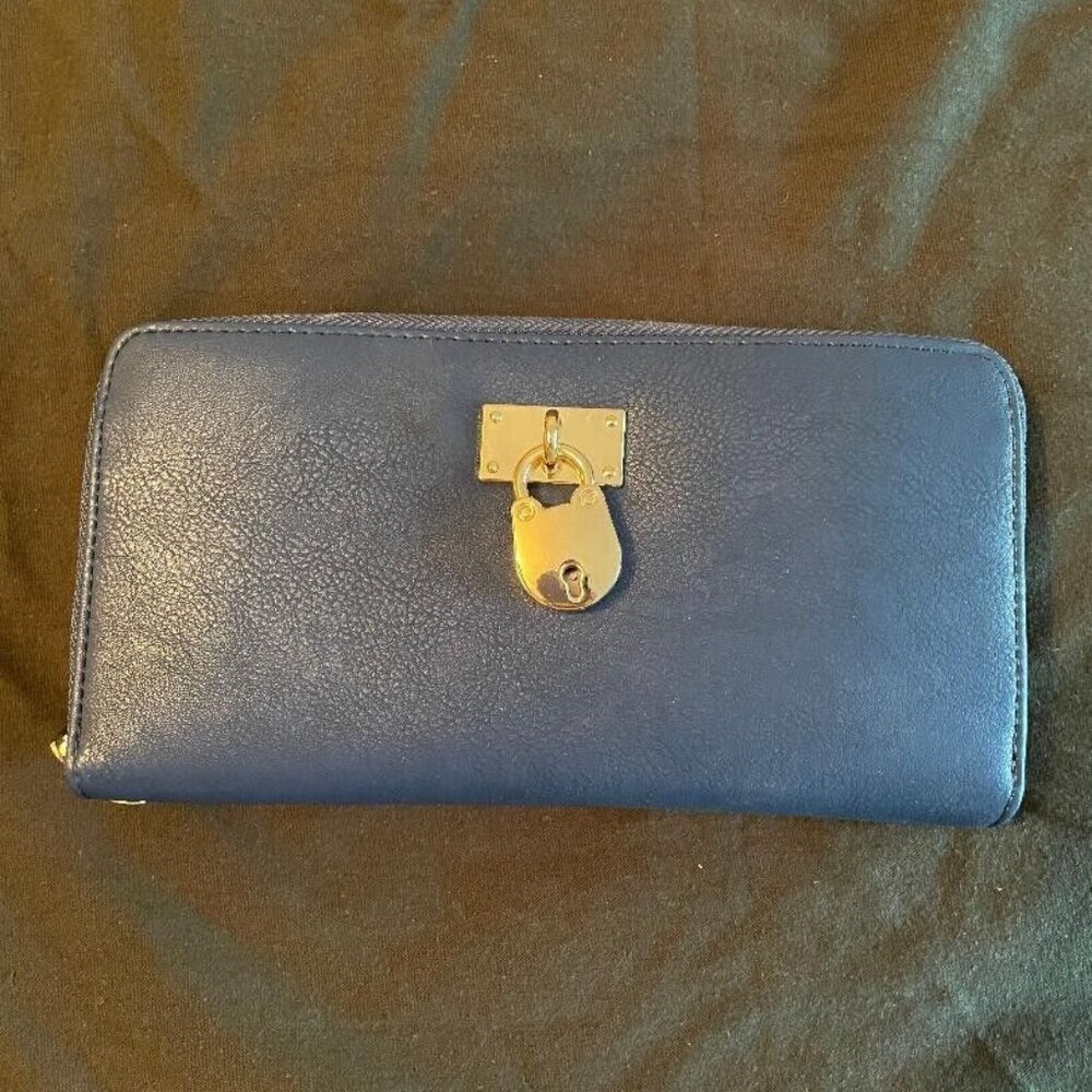 Blue Wristlet with strap and credit card slots and zippered coin pocket